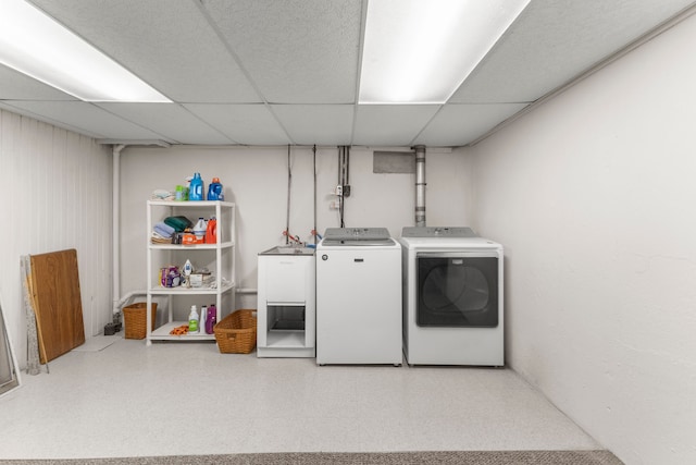 laundry area featuring washing machine and dryer