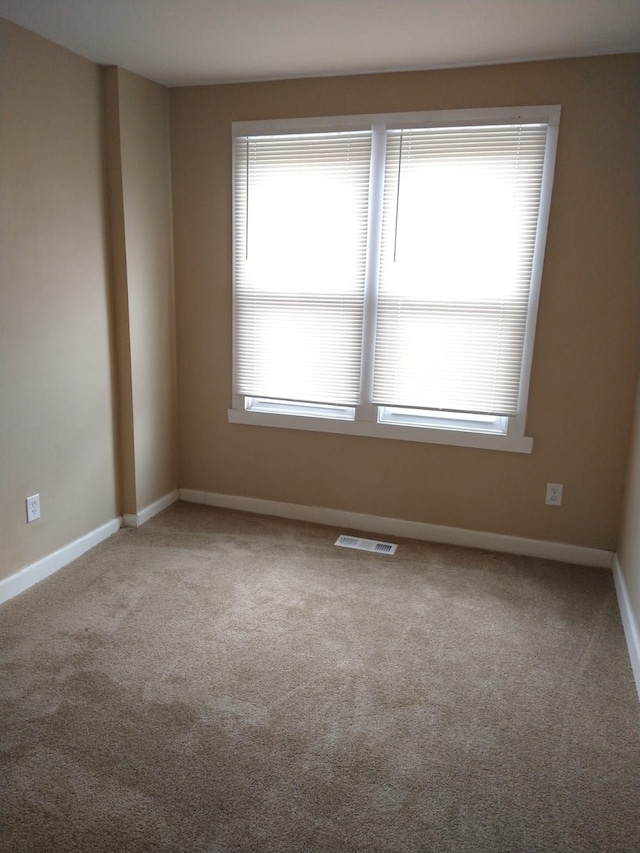 view of carpeted spare room