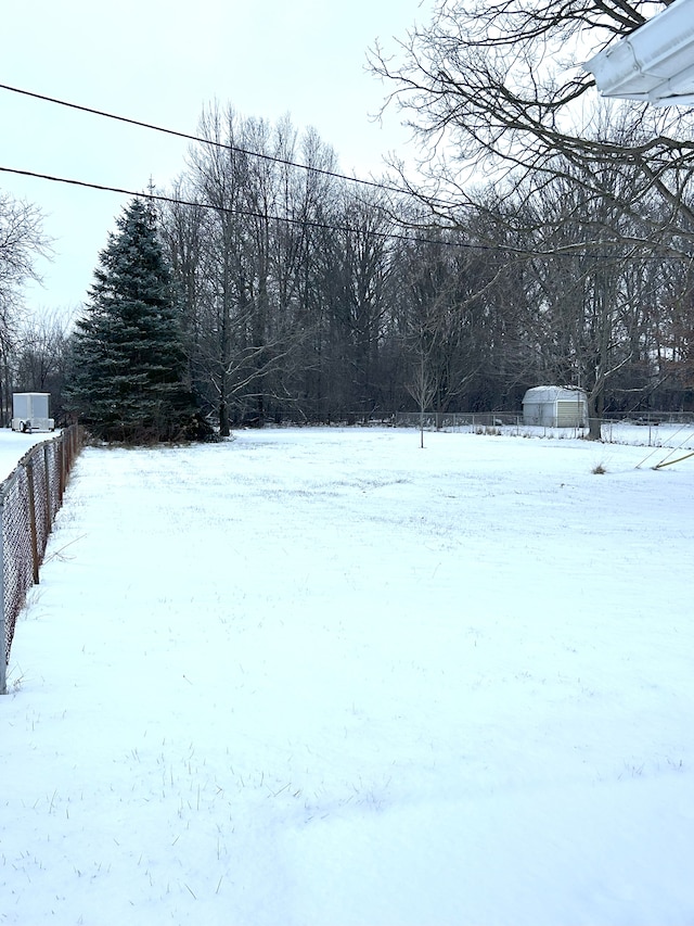 view of yard covered in snow