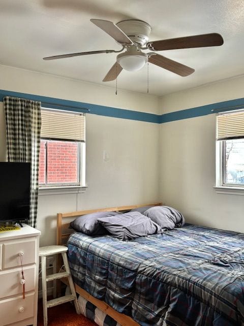 bedroom featuring ceiling fan