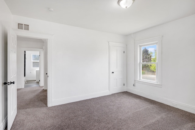 view of carpeted spare room