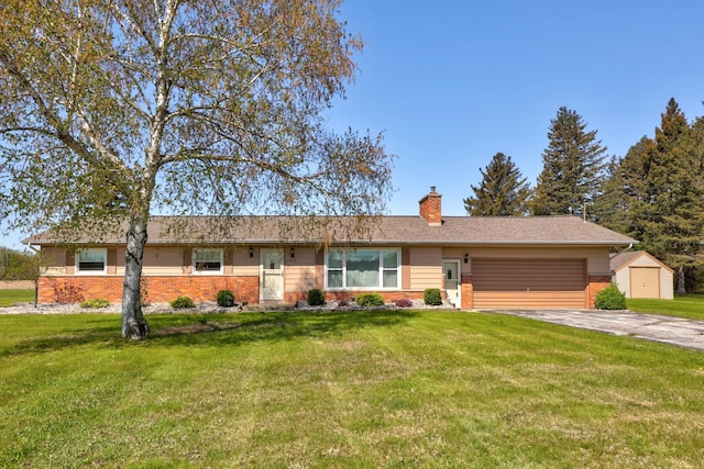 9800 Gera Rd, Birch Run, MI 48415 - single story home featuring brick siding, a storage shed, an attached garage, a chimney, and a front yard