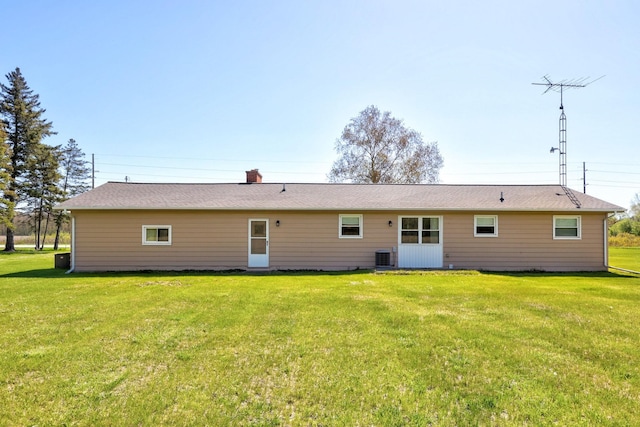 9800 Gera Rd, Birch Run, MI 48415 - back of property featuring a yard and a chimney