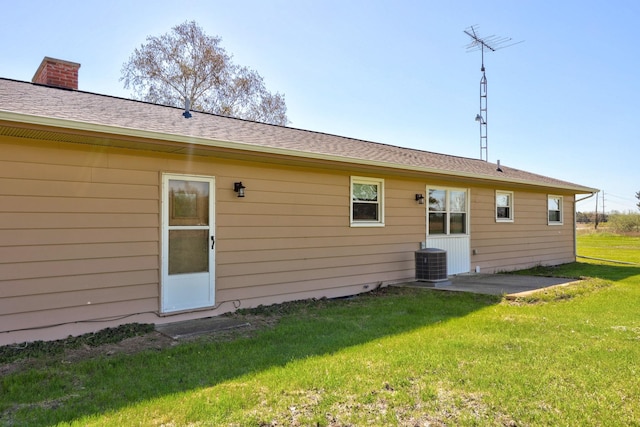 9800 Gera Rd, Birch Run, MI 48415 - back of house featuring central AC, a yard, and a patio area