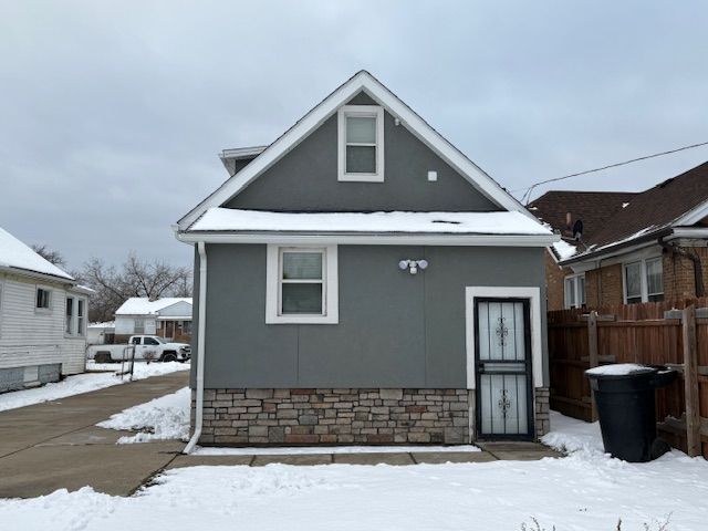 view of snow covered property