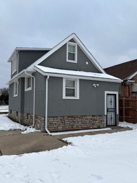 view of snow covered property