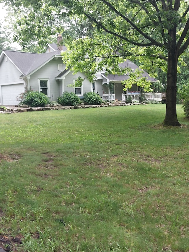 view of yard with a garage