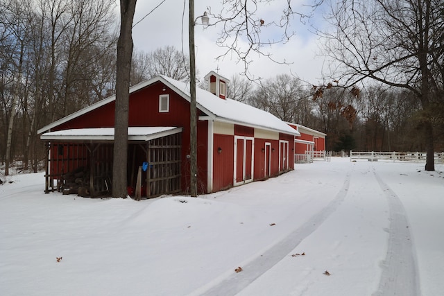 view of snow covered garage