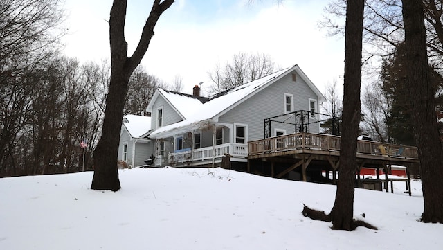 snow covered property with a gazebo