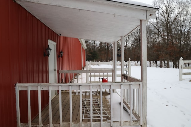 view of snow covered deck