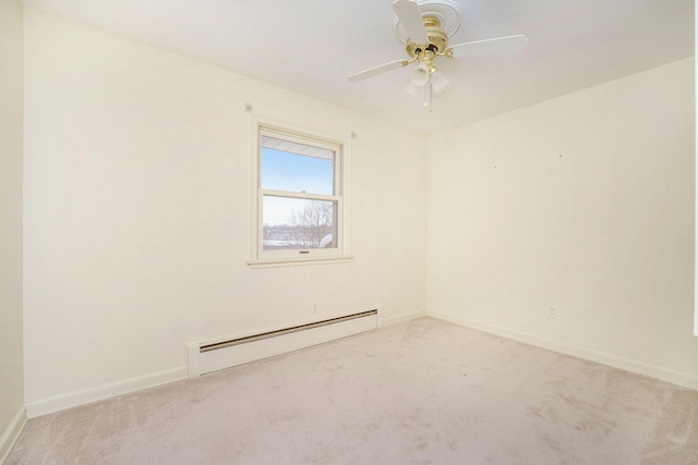 empty room with light carpet, a baseboard heating unit, and ceiling fan