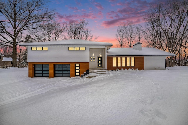 view of front of house with a garage