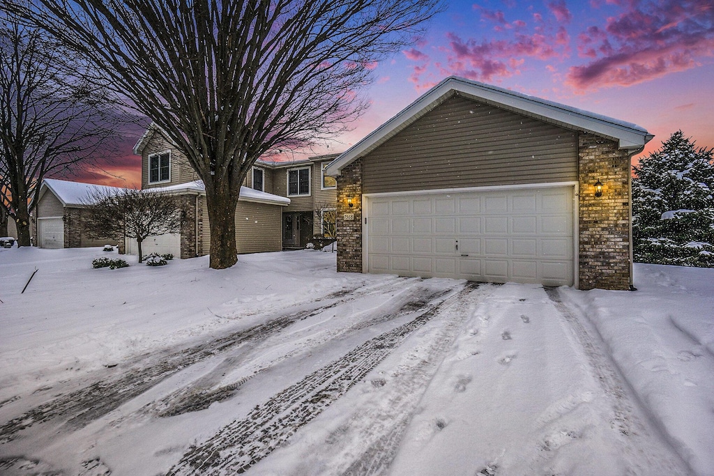 view of front of property with a garage