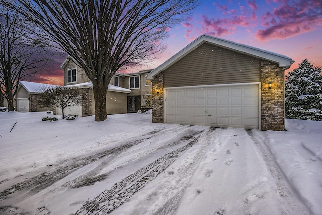 view of front of property with a garage