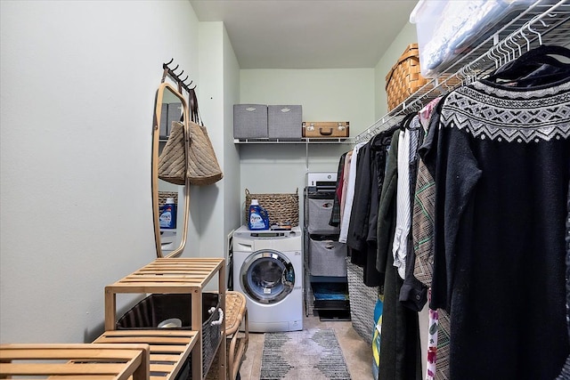 washroom with washer / clothes dryer