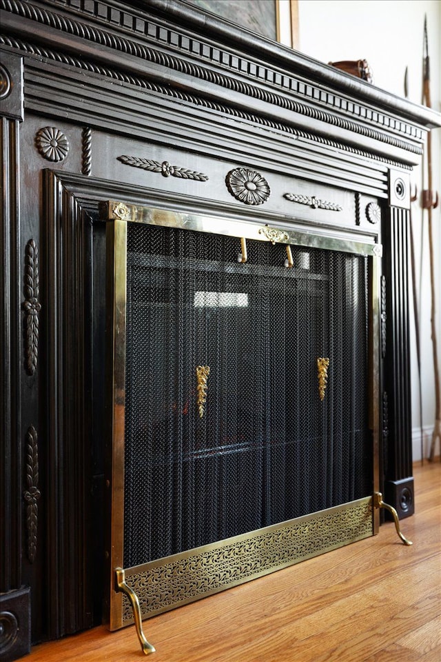 interior details featuring wood-type flooring