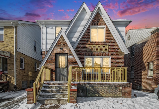 view of snow covered house