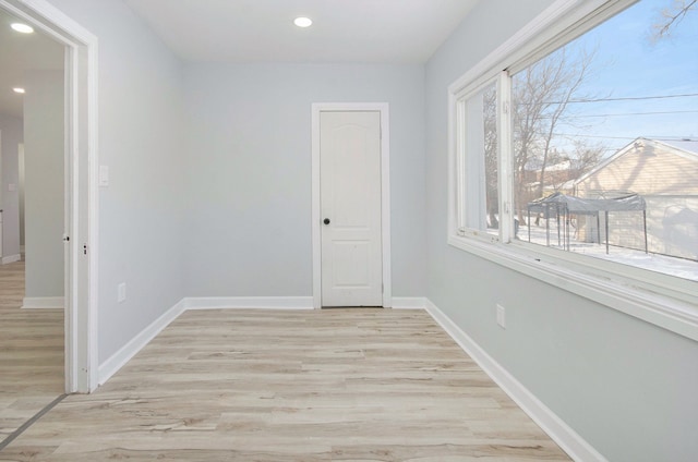 hallway featuring light wood-type flooring