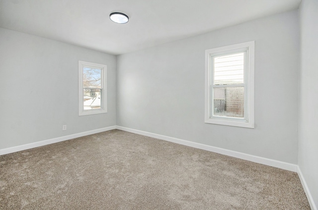 empty room with carpet floors