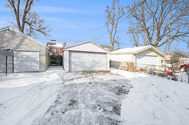 view of snow covered garage