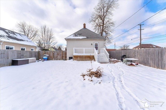 view of snow covered property