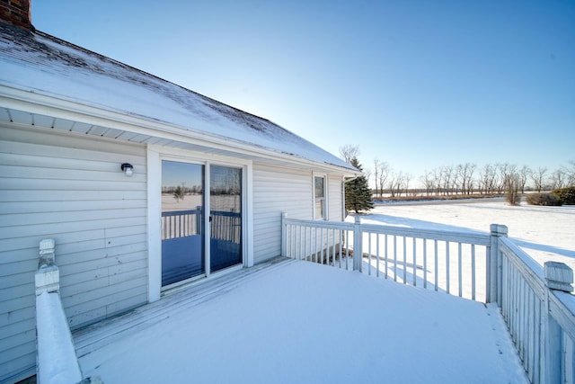 view of snow covered deck