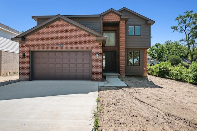 front of property with a garage