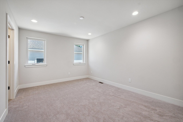 view of carpeted spare room