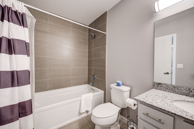 full bathroom featuring vanity, toilet, and shower / tub combo with curtain