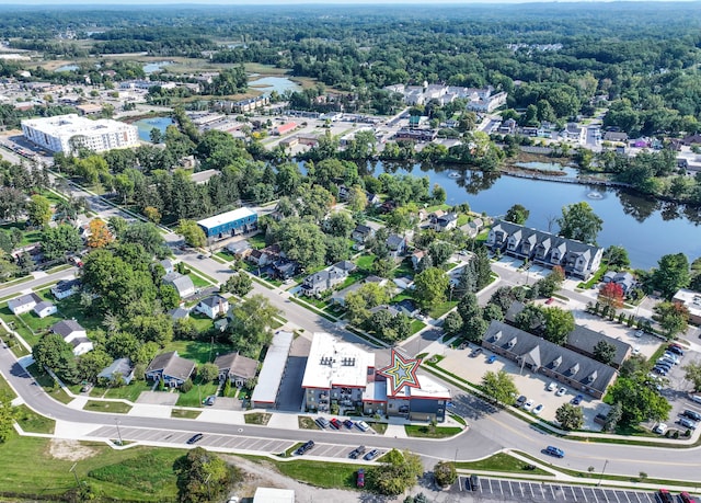 drone / aerial view with a water view