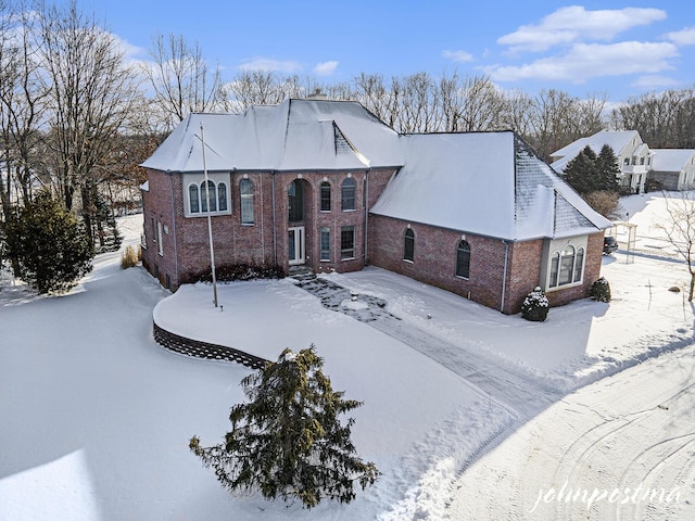 view of snow covered property