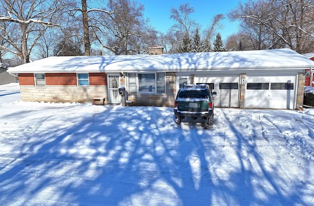 ranch-style home with a garage