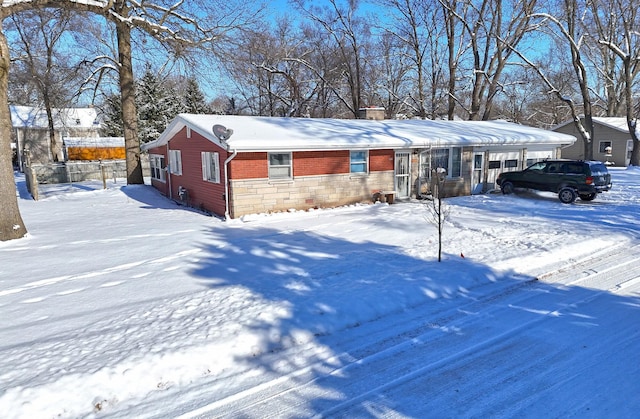 view of front of home featuring a carport