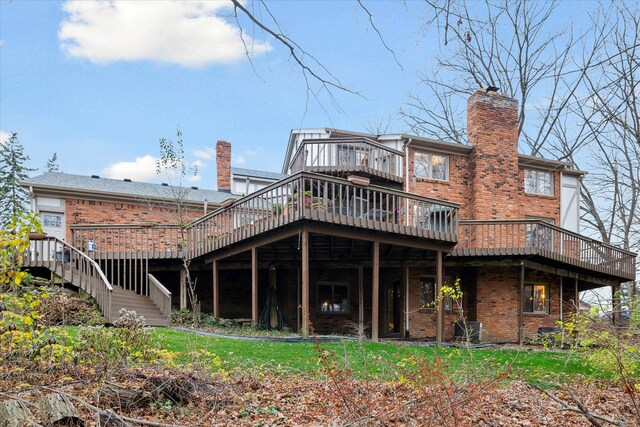 rear view of house with a deck