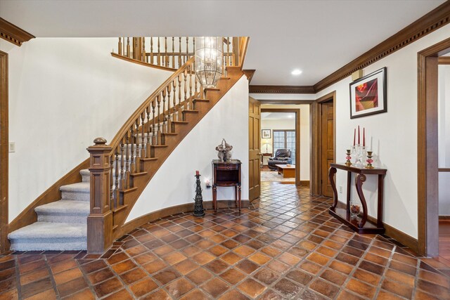 interior space featuring crown molding