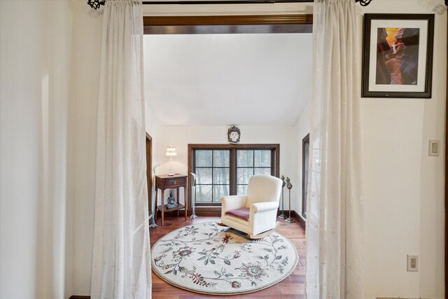 living area with wood-type flooring