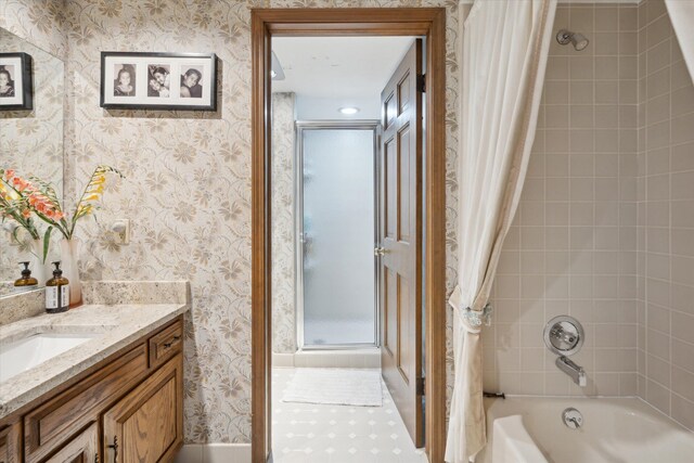 bathroom with shower / bath combo and vanity