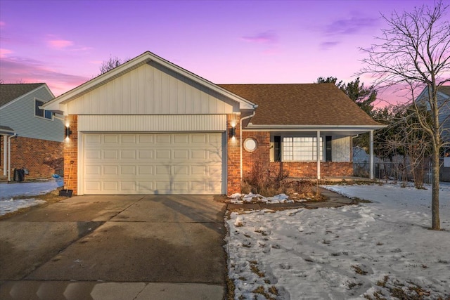 single story home with a garage