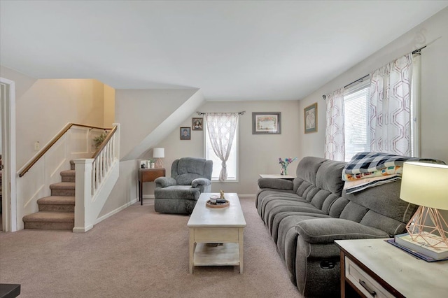 carpeted living room with a healthy amount of sunlight