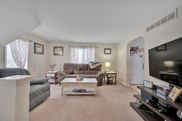 living room with light colored carpet