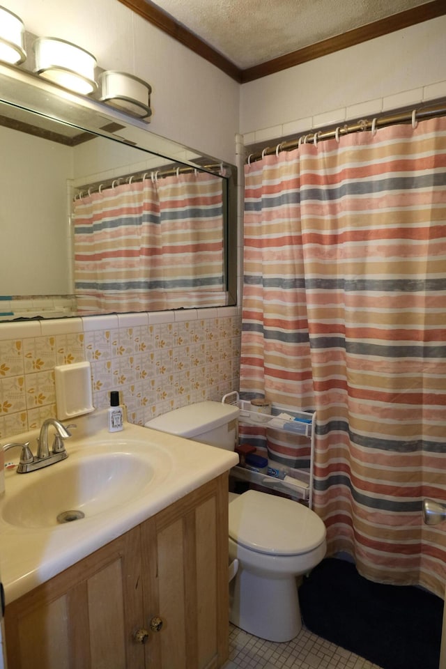 bathroom featuring a textured ceiling, tasteful backsplash, toilet, vanity, and crown molding