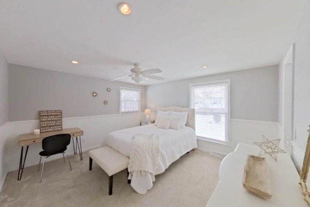 bedroom featuring baseboards, recessed lighting, a ceiling fan, and light colored carpet