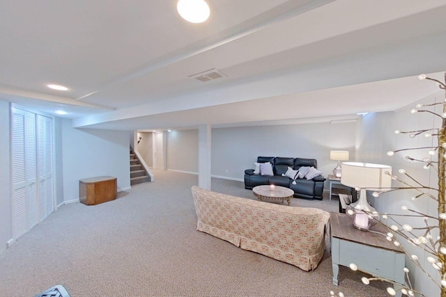 living area with stairs, visible vents, carpet, and baseboards