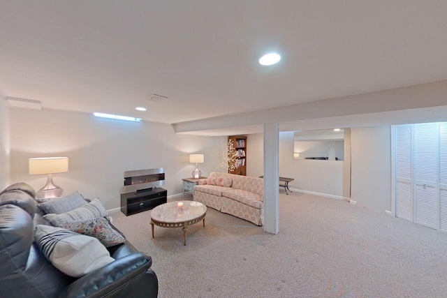 living area featuring recessed lighting, carpet floors, and baseboards