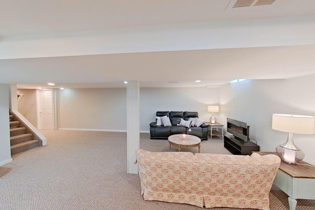 carpeted living room with recessed lighting, stairs, and visible vents