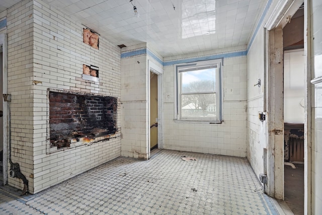 649 Van Dyke St, Detroit, MI 48214 - living room with tile walls and ornamental molding