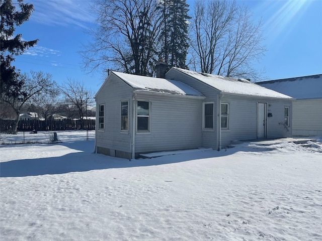 view of snow covered house