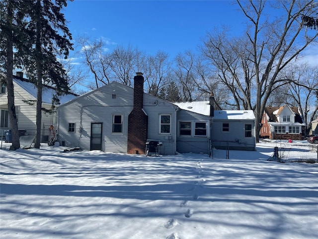 view of snow covered property