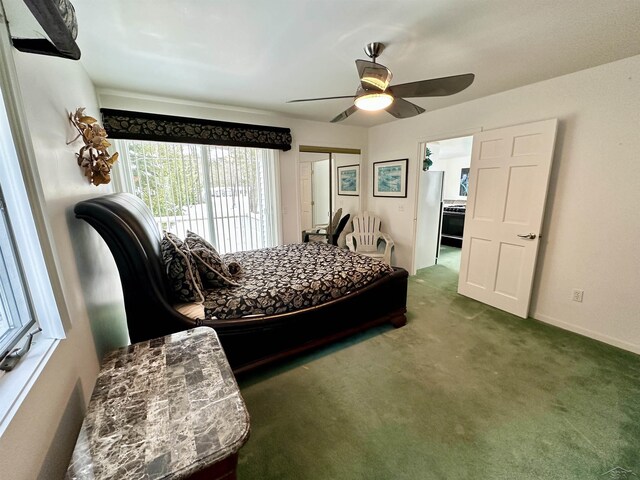 bedroom with ceiling fan, a closet, and dark carpet