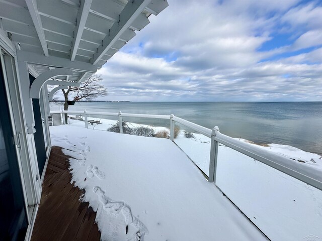 balcony featuring a water view